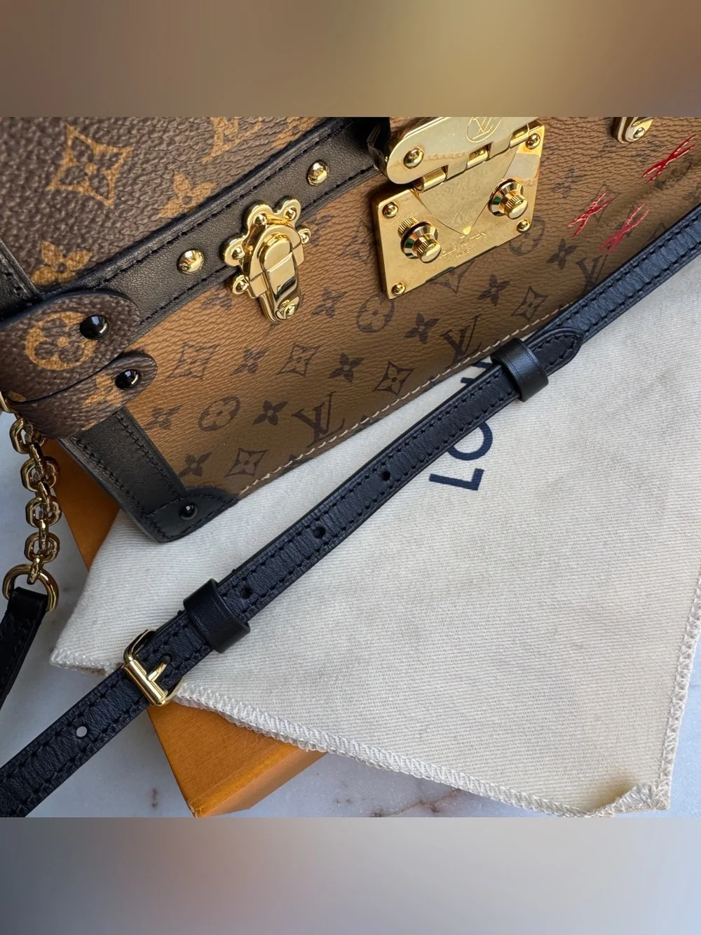 Louis Vuitton Reverse Monogram Trunk Clutch